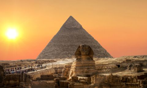 Sunset over Sphinx and Pyramid of Chefren in Giza